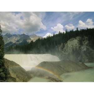  A Rainbow Forms over a Waterfall in Kicking Horse River 