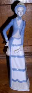 Tall Ceramic Victorian Woman Figurine  