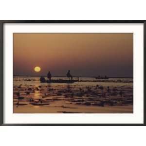 Fishermen Take in the First Rays of the Rising Sun on Lake Okeechobee 