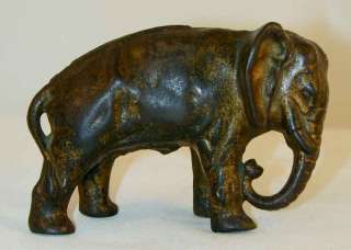   Cast Iron Golden Still Penny Bank Elephant w/ Tucked Trunk Arcade Co