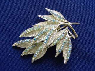 this vintage doddz light blue ab aurora borealis rhinestone leaf pin