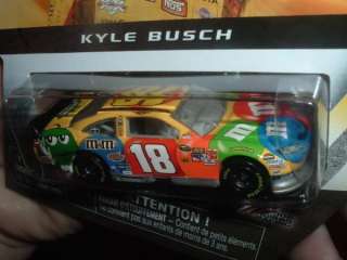 Kyle Busch #18 M & Ms 2012 NASCAR Authentics Spin Master 1:64  