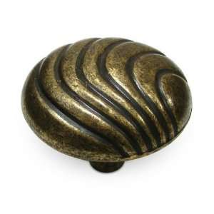 Village expression   1 3/8 diameter creased knob in burnished brass