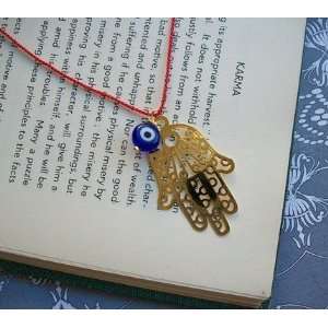     Red Silk and Gold Hamsa with Blue Evil Eye Bead 