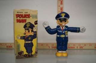 MODERN TOYS 1950S WHISTLING POLICEMAN TRAFFIC COP TIN TOY & BOX  
