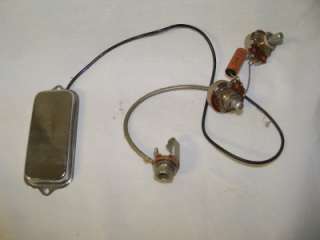 You are bidding on a old Kay archtop pickup, pots,input jack,harness 