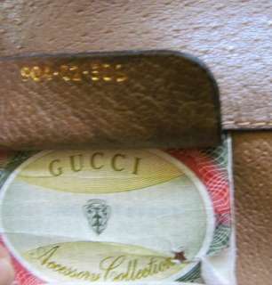   GUCCI Accessory Collection Clutch Bag   VERY unusual, but its peeling