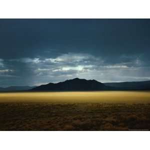  Sun Permeates Rain Clouds to Brighten Black Rock Desert, Nevada 