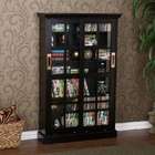   is complete with tempered glass doors in front of an adjustable shelf