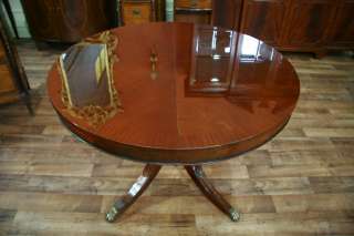 44 round mahogany dining table, drum table with leaf