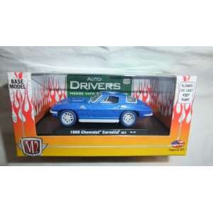  M2 MACHINES 164 AUTO DRIVERS BLUE WITH WHITE RIMS AND 