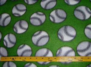 Soft fleece fabric by the yard green with baseballs  